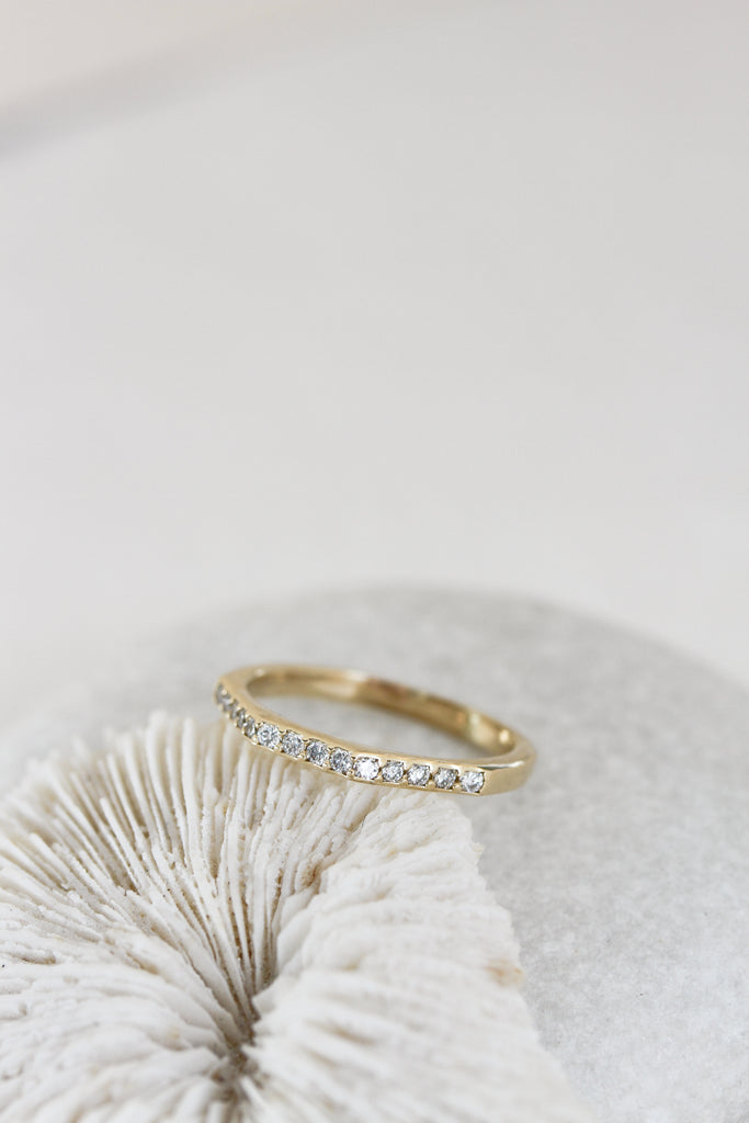 gold half-diamond Pavé band