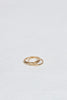 stack of three gold dome shaped thin bands