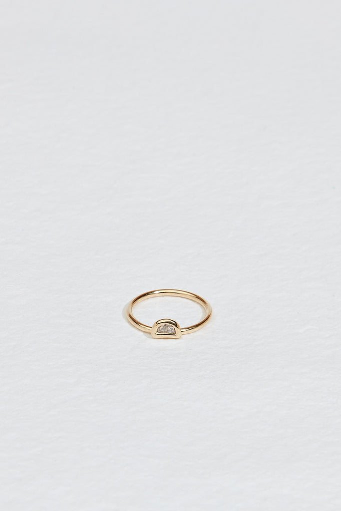 gold ring with off set salt and pepper half moon diamond