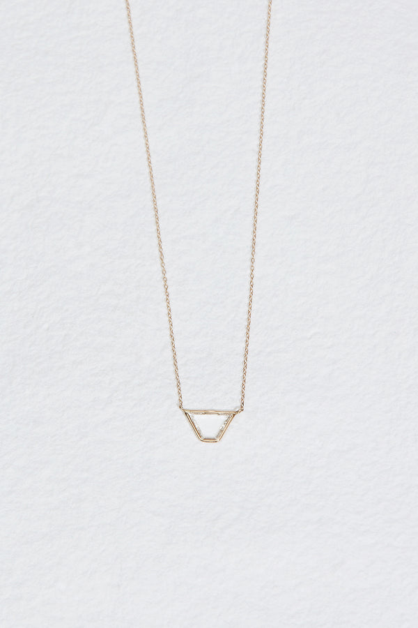 gold necklace with trapezoid shaped diamond slice