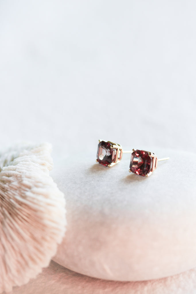 malaya garnet asscher cut studs