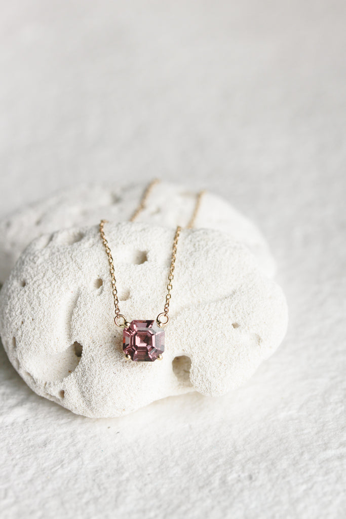 gold necklace with asscher cut malaya garnet