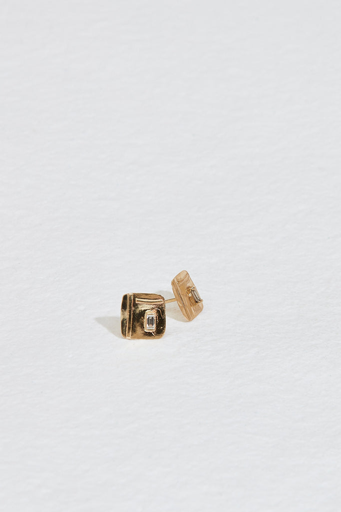 free form gold square studs with baguette white diamond