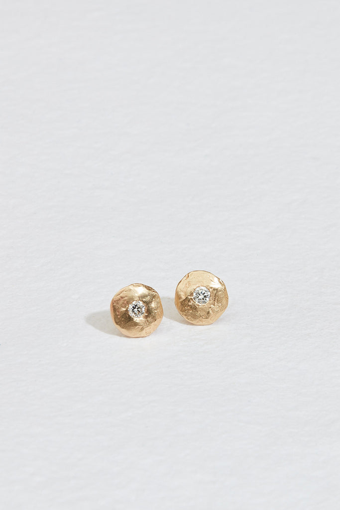 gold disc studs with round white diamond