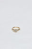 gold ring with bezel set round salt + pepper diamond