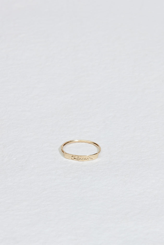 gold ring with hand engraved front plate