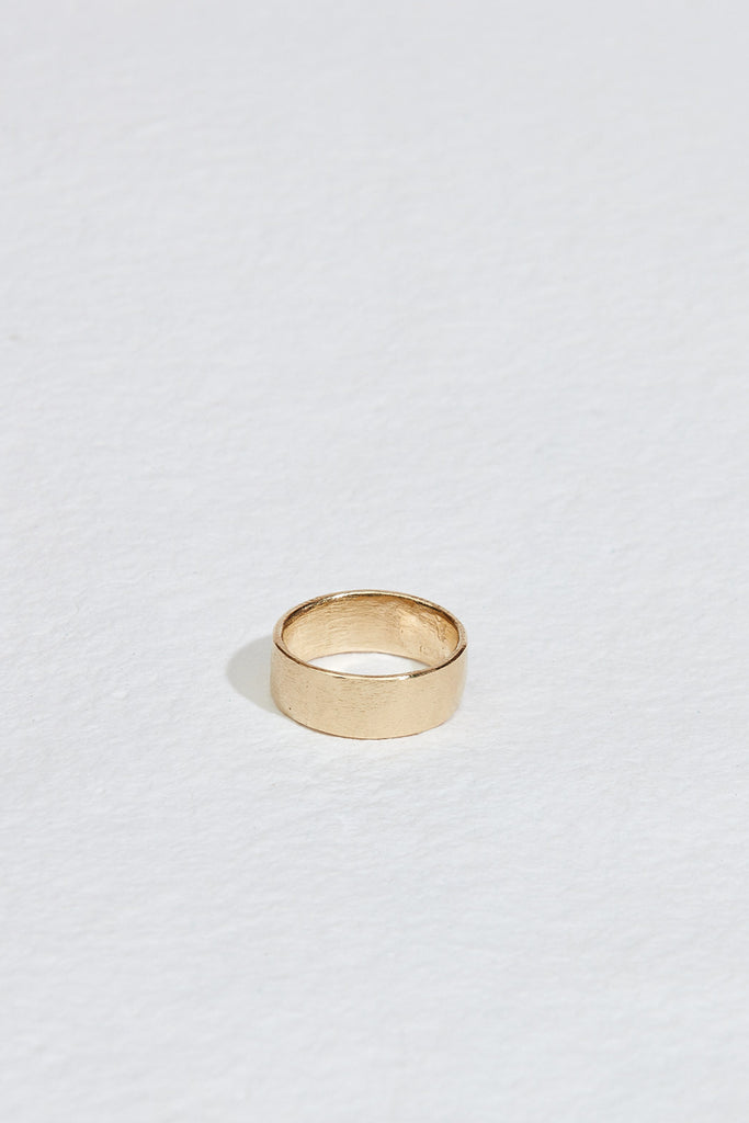 lightly textured gold band with straight sides