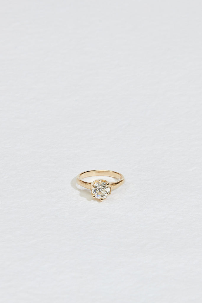 gold six prong ring with old euro cut round diamond