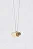gold necklace with three round disks