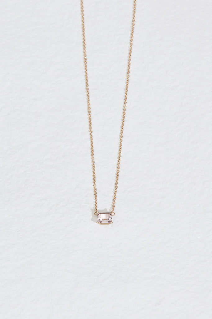 gold necklace with emerald cut morganite