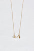 gold necklace with sideways gold tulip