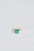 Open Bottom Cathedral Bezel set colombian emerald ring with a gold soft knife edge band