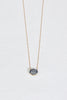 gold necklace with oval cloud sapphire