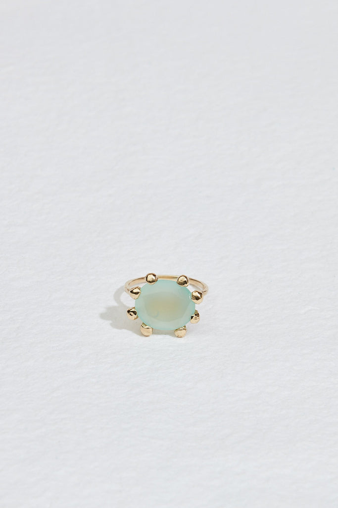 gold ring with xl prongs and chalcedony