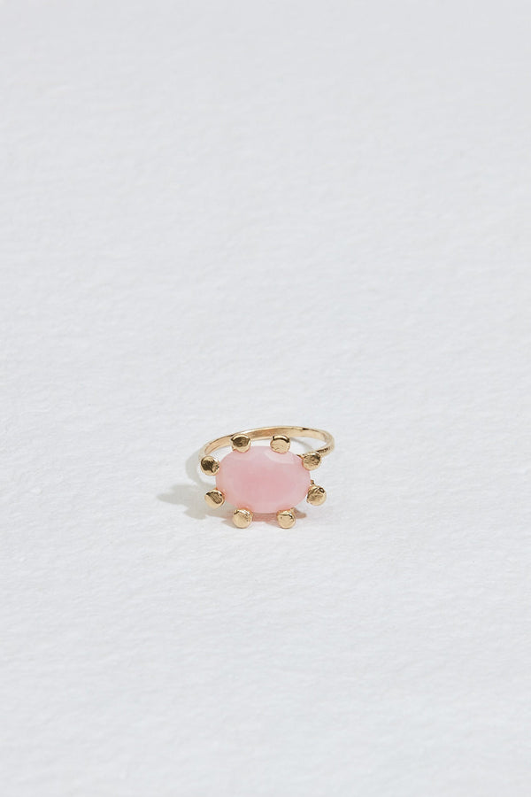 gold ring with xl prongs and pink opal