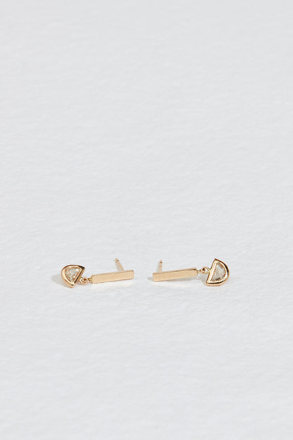 gold bar earrings with bezel set half moon salt and pepper diamond