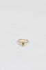 gold ring with bezel set emerald cut white diamond