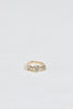 gold ring with three bezel set round white diamonds