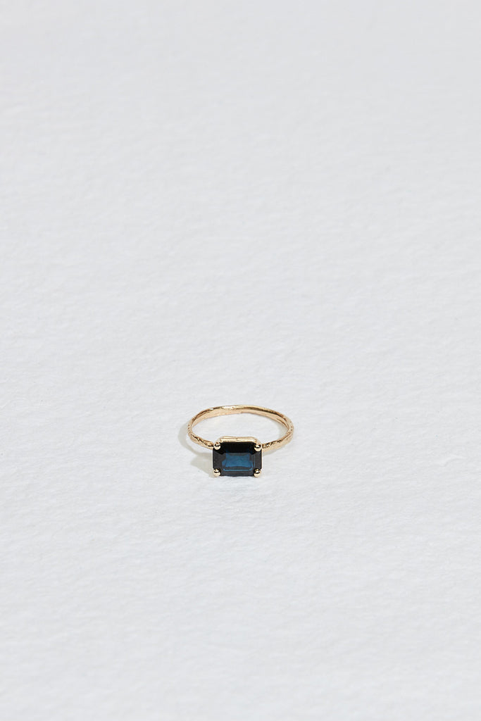 gold four prong twig ring with rectangle sapphire