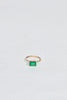 gold four prong twig ring with rectangle emerald