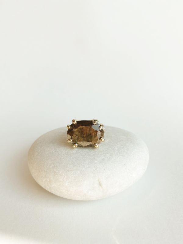 gold 8 prong ring with oval chocolate sapphire