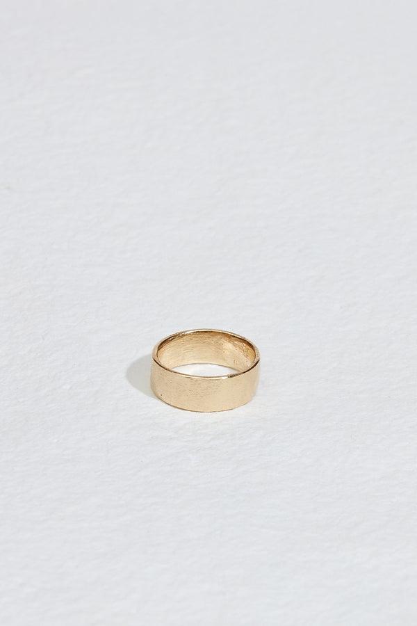 lightly textured gold band with straight sides
