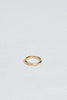 rounded gold band with white diamonds