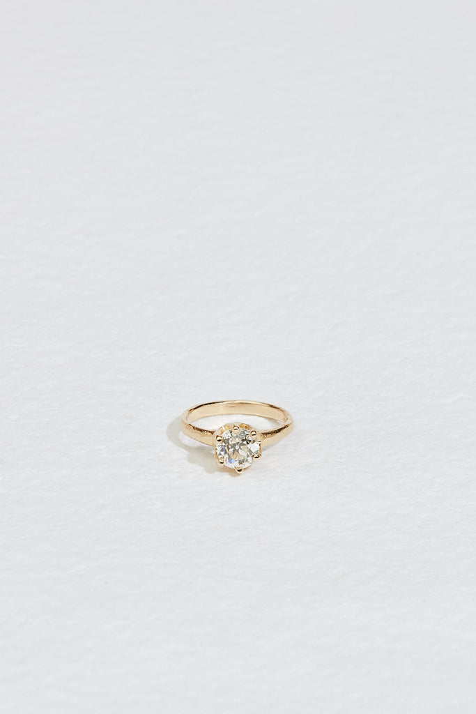 gold six prong ring with old euro cut round diamond