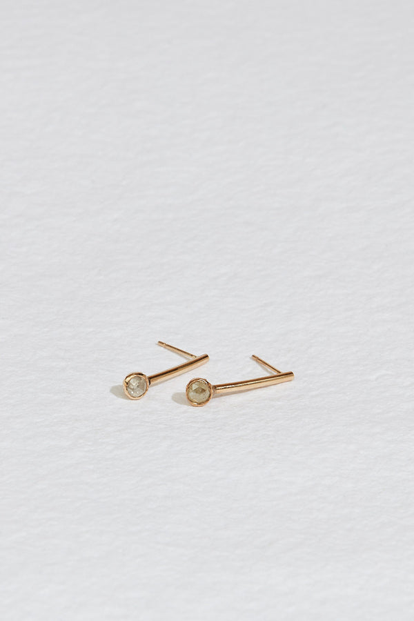 gold bar earrings with bezel set rose cut gray diamond